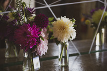vases of flowers at a wedding 