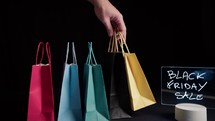 Black Friday advertising with shopping bags 