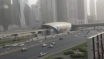 Rush hour, busy traffic, cars, vehicles on Dubai highway by metro train in United Arab Emirates in Middle East.