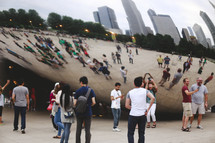 crowd near iconic sculpture in Chicago 