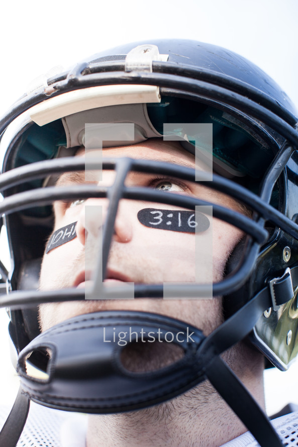 football player with John 3;16 on his face 