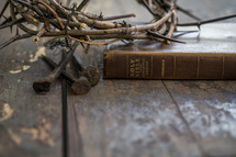 crown of thorns, three nails, and Bible 