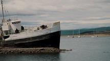 Old And Abandoned Ship In Ushuaia, Tierra del Fuego, Argentina, Patagonia. - wide shot