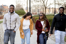 young adults walking together 