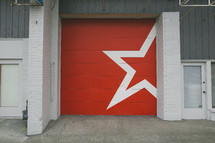 white star on red garage doors 