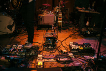 guitar pedals on a stage 