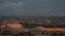 This is an early morning time-lapse of the sun rising over the Old City of Jerusalem. Vantage point is from the Mount of Olives.