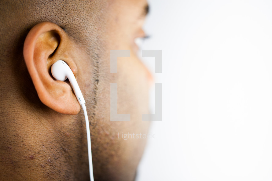 man with earbuds in his ears