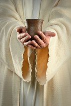 Jesus holding a cup 