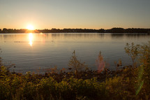 sunrise over a lake 