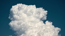 Timelapse of a white fluffy cloud