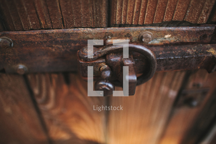 metal latch on a wood door
