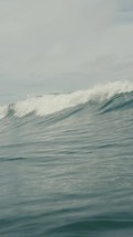 Pacific Ocean waves on a beautiful day in a tropical country