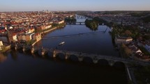 Prague waterside and Charles Bridge, aerial view