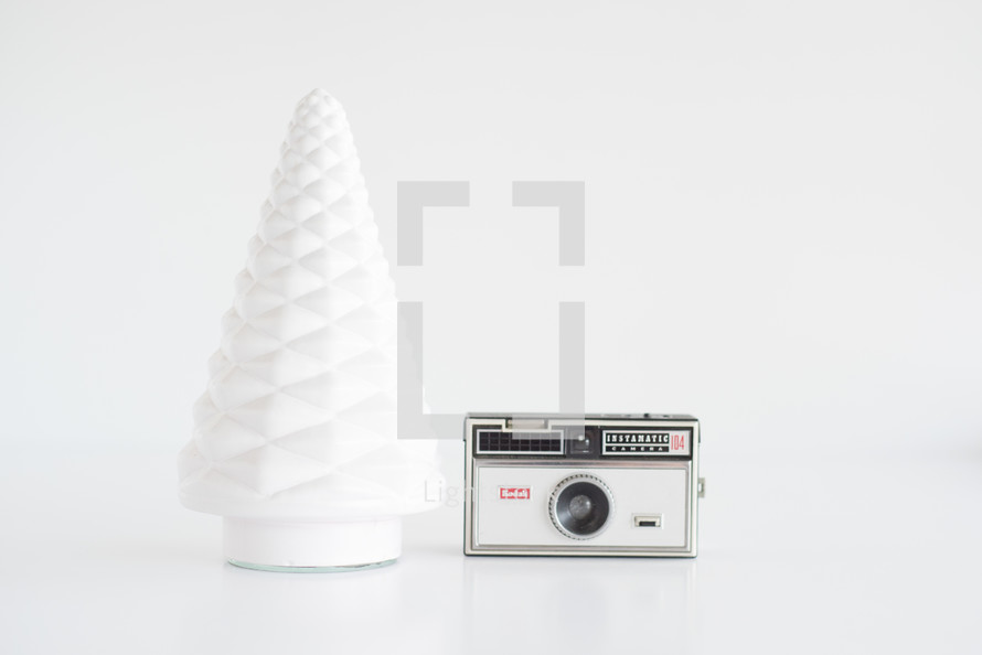 white Christmas tree and camera 
