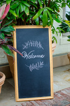 welcome sign on chalkboard 
