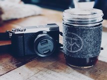 coffee cup and camera 