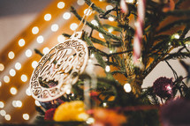 Merry Christmas ornament on a Christmas tree 
