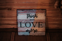 Think less love more sign 
