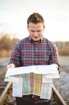man reading a map 