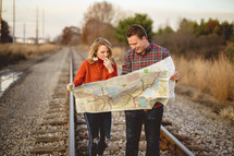 lost couple looking at a map 