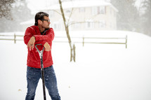 a man shoveling snow 