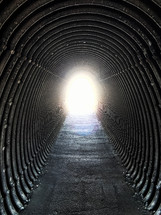 Light at the end of arched tunnel
