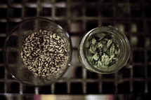 grains and spices in glasses