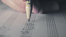man composing music 