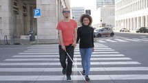 a couple walking together in a city 