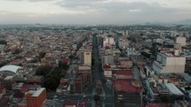 Panoramic View Of Mexico City Skyline - Ciudad de México On A Cloudy Day - aerial drone shot	