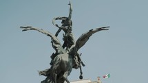 Rotating shot of Pegasus Statue in front of Bellas Artes Palace in Mexico City	