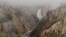 Time Lapse of Lower Falls in Yellowstone River at Grand Canyon of the Yellowstone National Park, Wyoming in Morning Fog viewed from Artist Point	
