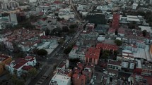 Flying Over Southern Mexico City, CDMX On A Cloudy Day - aerial drone shot	