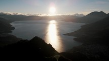 Sunrise view of Indians Nose, San Pedro and Toliman volcanoes in Lake Atitlan, Guatemala	