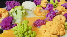 Fried colorful cauliflower drenched with fried chicken eggs