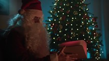 the Magic of Christmas inside a glowing red book