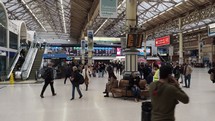 Travelers at Victoria Station in London, UK