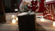 Blurred Santa Claus opening an enchanted book