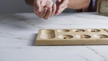 Mancala board game wooden table