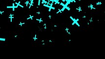 Particles of blue religious crucifixes pass on the black background