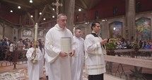 Nazareth, Israel, December 24, 2018. Priests performing the Christmas mass in the Basilica of the Annunciation