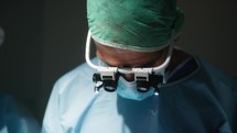 Surgeon Operates On The Eye Retina