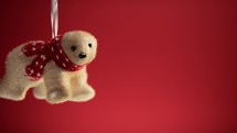 Bear Christmas decoration on red copy space background