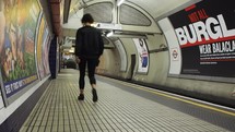 LONDON, UK: London tube station platform - EDITORIAL USE ONLY
