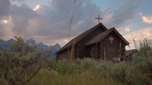 Old Wooden Chapel in the Mountains at Sunset