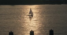 New York city motorboat passing sailboat