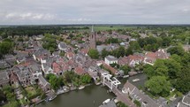 Aerial view of drawbridge over river Vecht and church tower, Loenen aan de Vecht