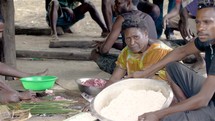 people preparing food in Papua New Guinea 