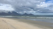 Stunning early morning Cape Town clouds over Table Mountain beach landscape